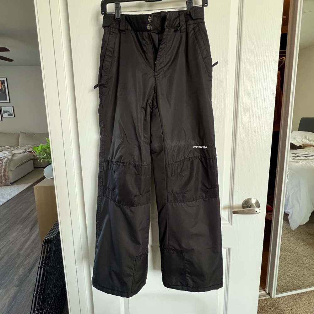 Black snowboard pants.